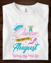 White t-shirt with colorful graphic and text on a wooden surface